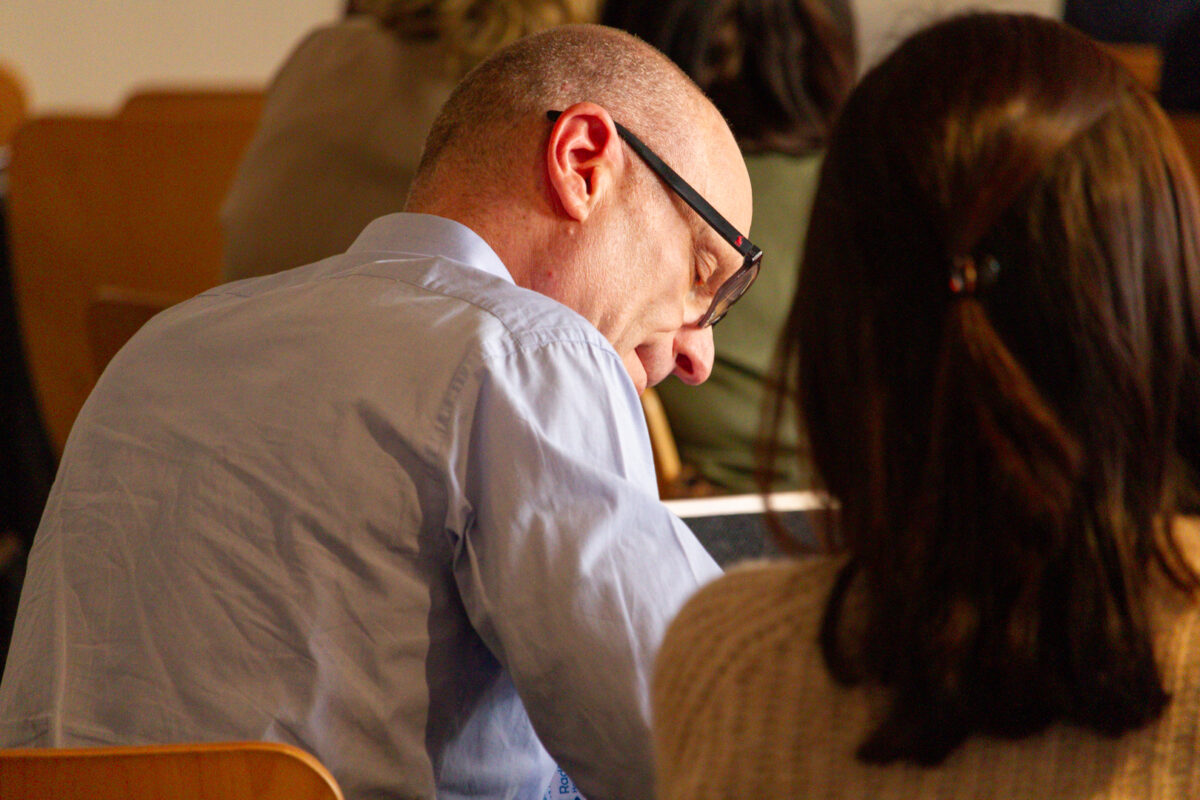 Radfield Home Care franchise partner taking notes at the 2025 conference