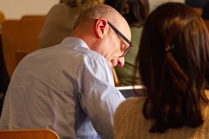 Radfield Home Care franchise partner taking notes at the 2025 conference